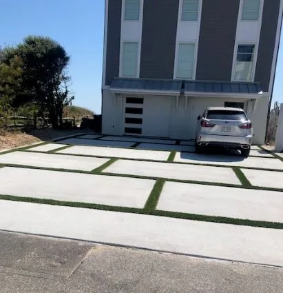 Modern home driveway with paver accents